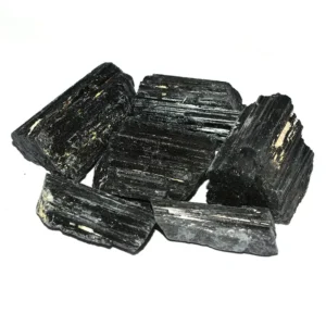 Raw Black Tourmaline Wholesale – natural columnar crystals grouped on a white background