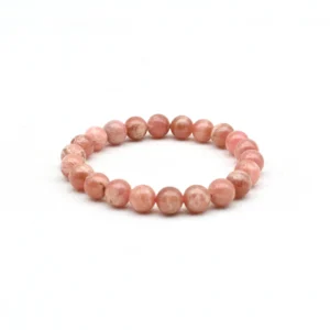 Rhodochrosite Bracelet Wholesale – single pink round bead bracelet on a white background