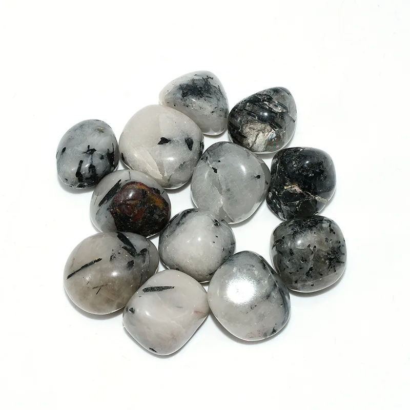 Tumbled Tourmalinated Quartz Wholesale – top view of polished stones with varied black inclusions